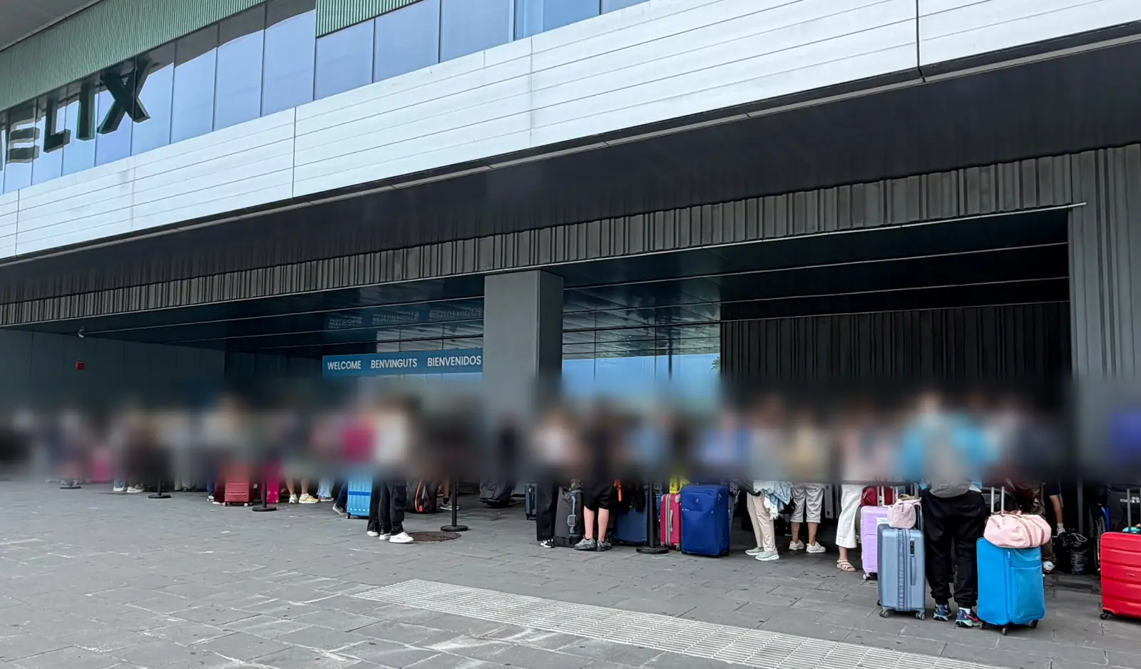Long luggage drop-off queue at Barcelona cruise terminal embarkation